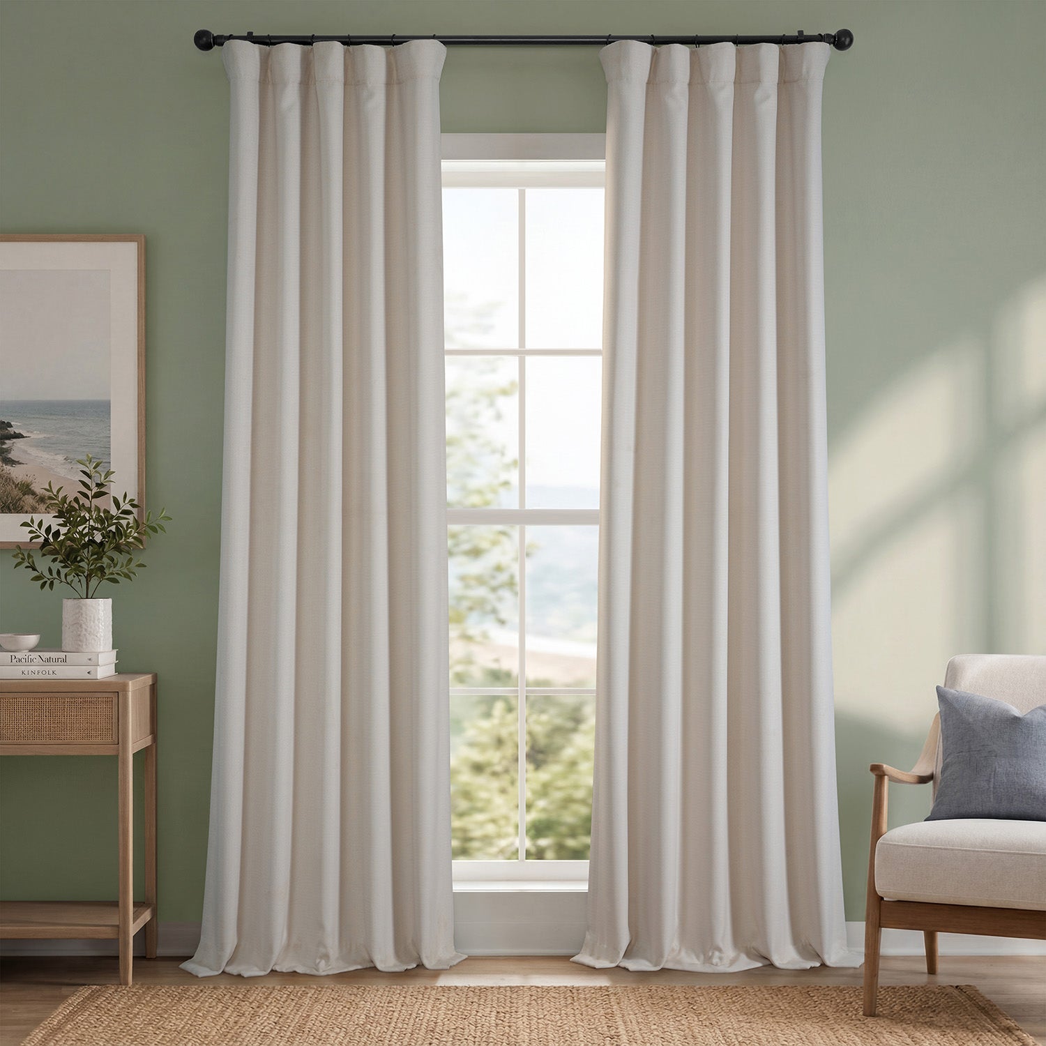 Striped curtains in a room with a window, chair, and side table.