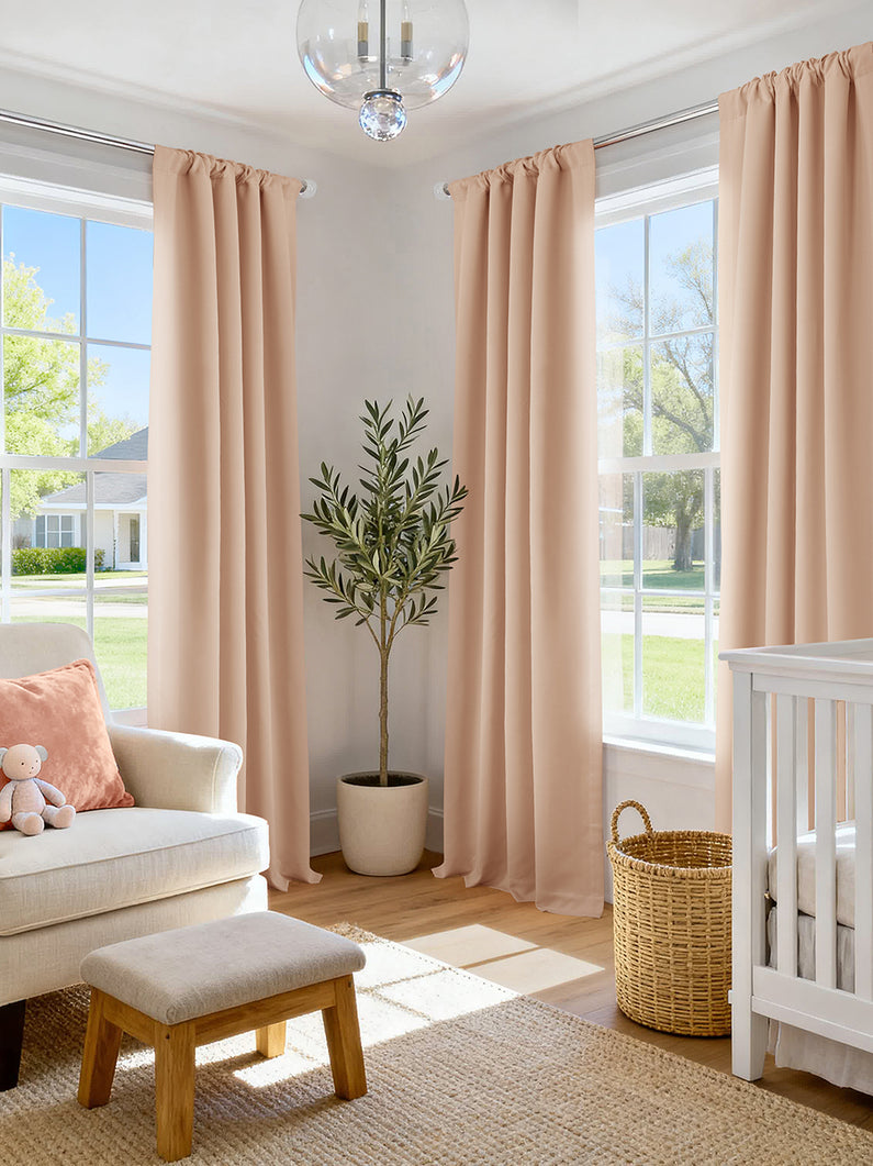 Bellini Peach: Soft peach curtains bring gentle warmth and a sweet, calming finish to this bright nursery