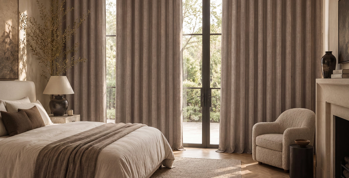 Dutch Cocoa: Dutch cocoa linen curtains frame tall glass doors, adding warm neutral texture and an elegant, cozy feel to a serene bedroom.