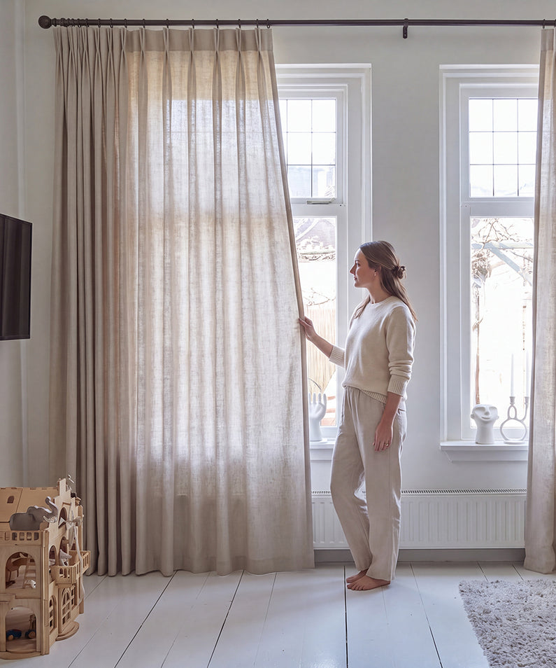 Semi-Sheer: Offering more coverage than a traditional sheer, semi-sheer curtains gently diffuse sunlight while adding softness, texture, and privacy.