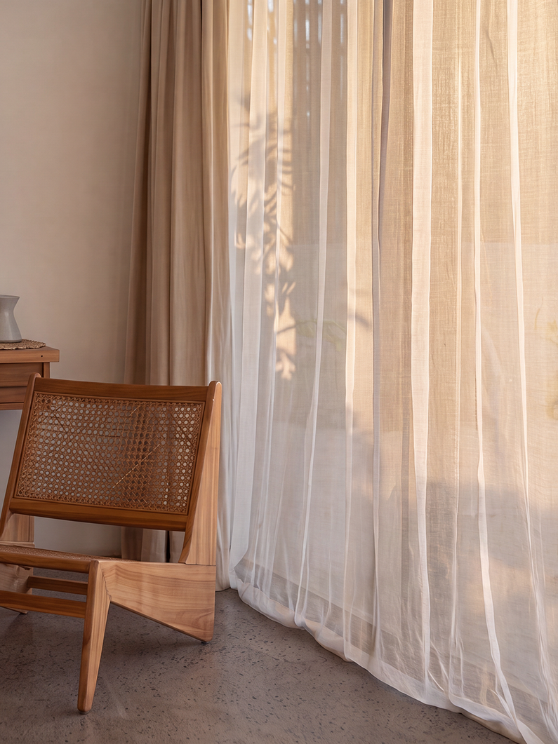 Semi-Sheer: Offering more coverage than a traditional sheer, semi-sheer curtains gently diffuse sunlight while adding softness, texture, and privacy.
