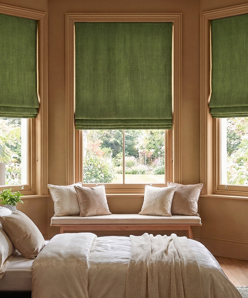 Khaki Green Textured Faux Linen: Khaki green textured Roman shades add natural color and tailored style to a bright, neutral living room.